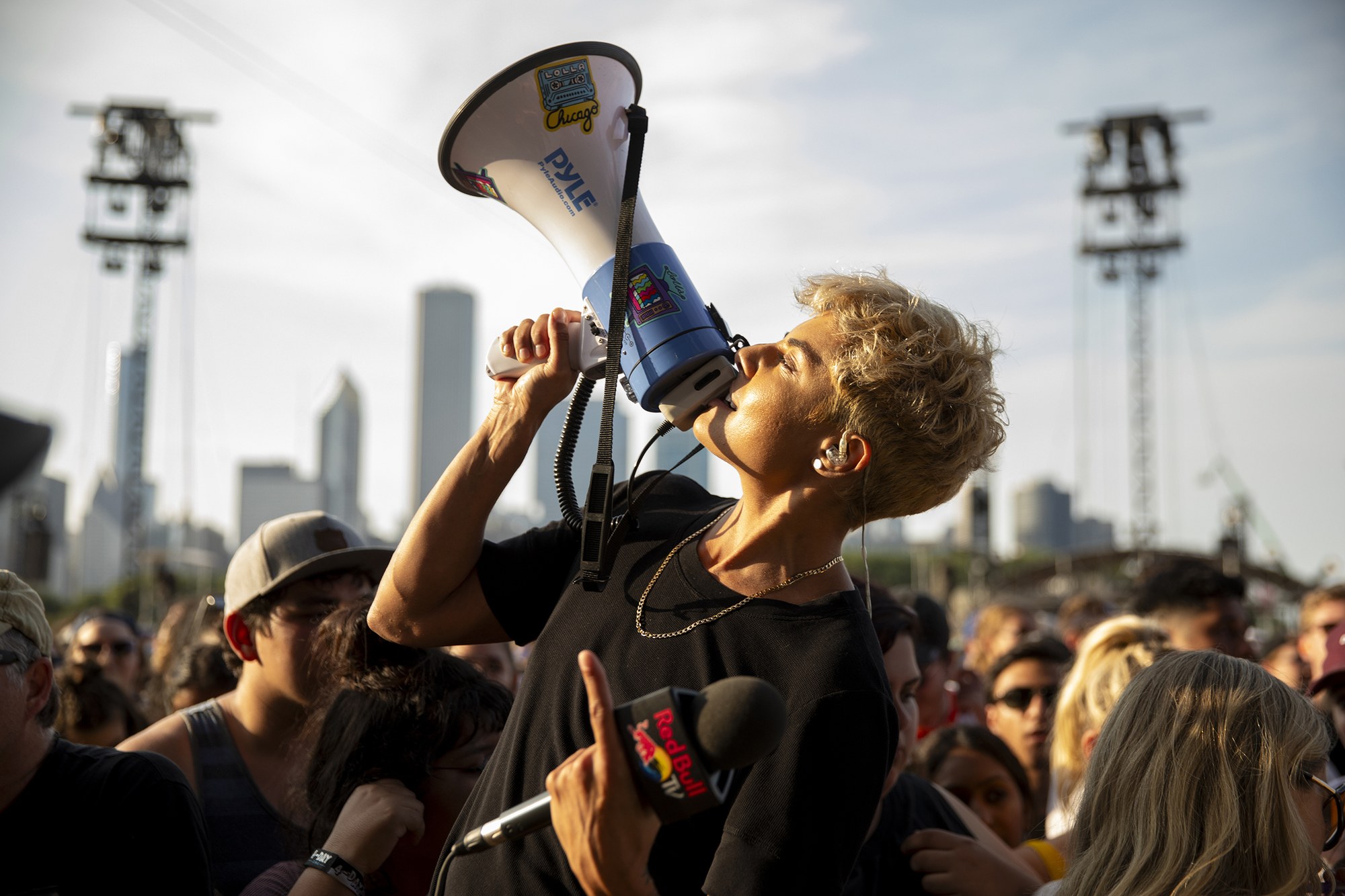 Hannah Rad on a megaphone in the festival crowd for Red Bull TV